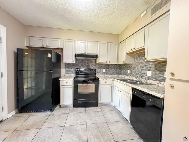 109 Stoneridge Dr, Warner Robins, GA 31088 - kitchen with black appliances, a sink, under cabinet range hood, backsplash, and a textured ceiling