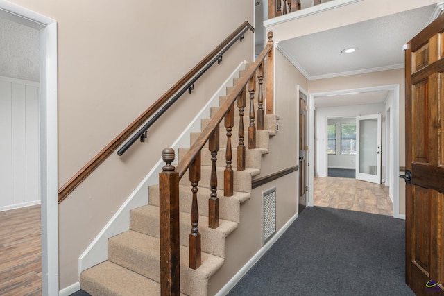 207 Oak Forest Ln, Warner Robins, GA 31088 - stairway featuring ornamental molding, baseboards, wood finished floors, and recessed lighting