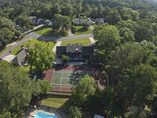207 Oak Forest Ln, Warner Robins, GA 31088 - aerial view of property's location with a pool area and a heavily wooded area