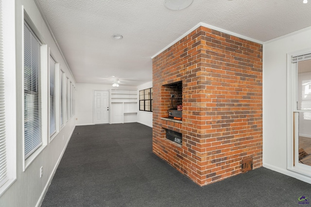 207 Oak Forest Ln, Warner Robins, GA 31088 - hall with carpet, baseboards, a textured ceiling, and ornamental molding