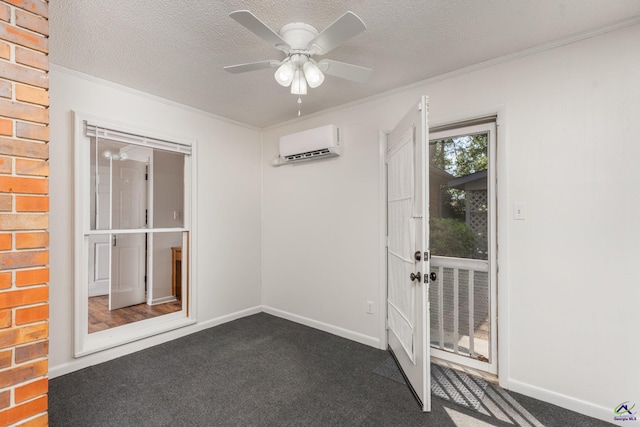 207 Oak Forest Ln, Warner Robins, GA 31088 - unfurnished room with a wall unit AC, dark carpet, crown molding, a ceiling fan, and a textured ceiling