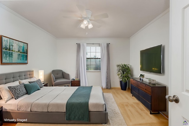 207 Oak Forest Ln, Warner Robins, GA 31088 - bedroom with crown molding, light colored carpet, baseboards, and a ceiling fan