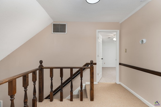 207 Oak Forest Ln, Warner Robins, GA 31088 - stairs with carpet floors, lofted ceiling, and baseboards