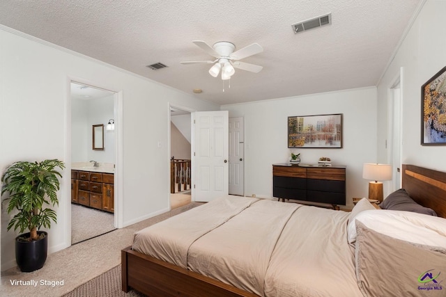 207 Oak Forest Ln, Warner Robins, GA 31088 - bedroom with crown molding, light colored carpet, a textured ceiling, ensuite bath, and a ceiling fan