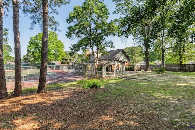207 Oak Forest Ln, Warner Robins, GA 31088 - view of yard with a tennis court