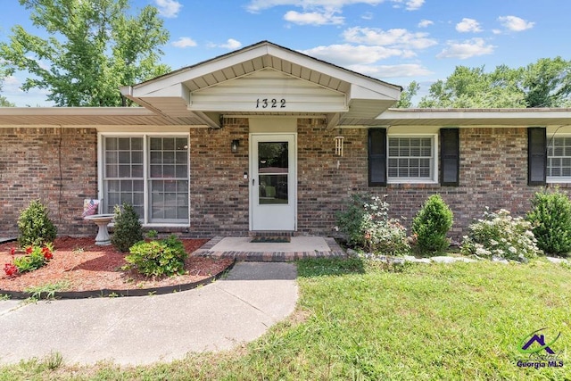 1322 Melford Dr, Columbus, GA 31907 - view of front of property with brick siding and a front yard