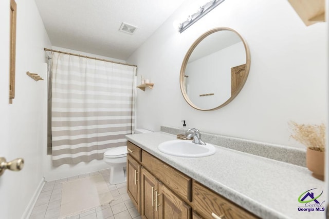 4407 Jones Rds, Macon, GA 31216 - full bath with vanity, toilet, tile patterned flooring, and shower / bath combination with curtain