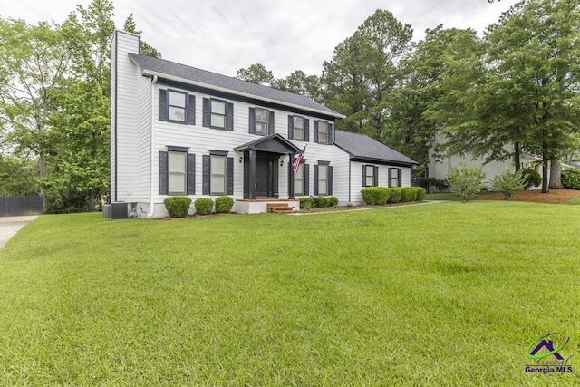 757 Silver Springs Drs, Macon, GA 31210 - colonial home with a chimney and central AC