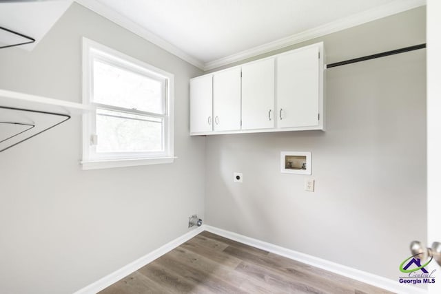 757 Silver Springs Drs, Macon, GA 31210 - laundry area with crown molding, hookup for an electric dryer, washer hookup, cabinet space, and baseboards