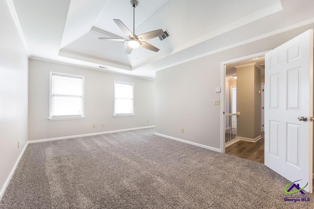 757 Silver Springs Drs, Macon, GA 31210 - carpeted spare room with a raised ceiling, ceiling fan, ornamental molding, and baseboards
