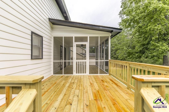 757 Silver Springs Drs, Macon, GA 31210 - wooden deck with a sunroom