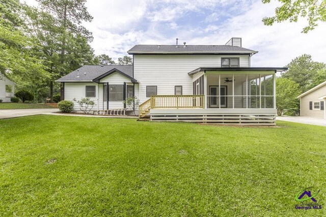 757 Silver Springs Drs, Macon, GA 31210 - rear view of house with a sunroom, a lawn, a chimney, and ceiling fan