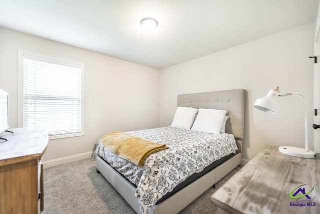 601 Hunts Landing Dr, Kathleen, GA 31047 - carpeted bedroom with baseboards