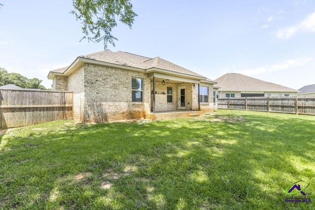 601 Hunts Landing Dr, Kathleen, GA 31047 - rear view of property with brick siding and a patio