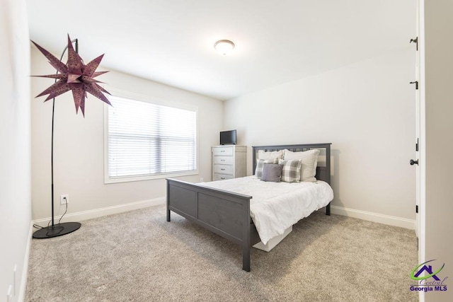 601 Hunts Landing Dr, Kathleen, GA 31047 - carpeted bedroom featuring baseboards