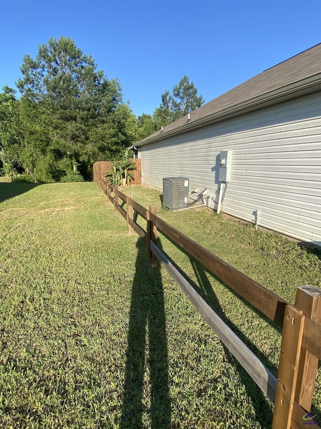 51 Cole Dr, Hawkinsville, GA 31036 - view of yard featuring central air condition unit