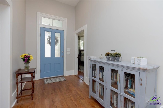 1360 Calhoun St, Macon, GA 31201 - foyer with wood finished floors and baseboards