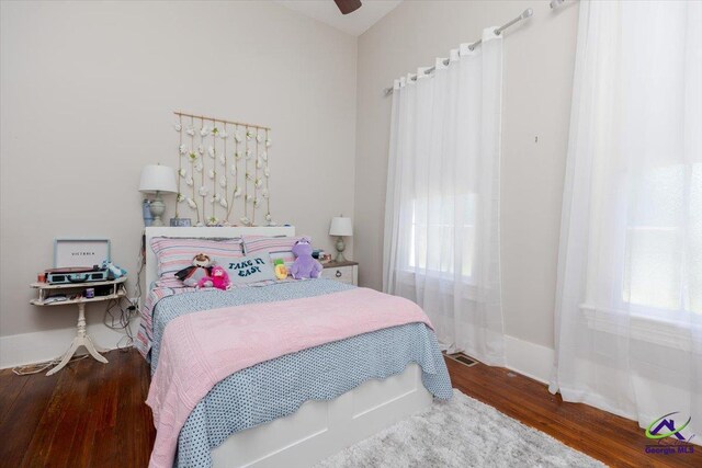 1360 Calhoun St, Macon, GA 31201 - bedroom with wood finished floors, baseboards, and ceiling fan