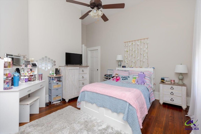 1360 Calhoun St, Macon, GA 31201 - bedroom featuring dark wood-type flooring, a high ceiling, and a ceiling fan