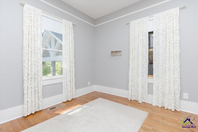 1360 Calhoun St, Macon, GA 31201 - unfurnished room featuring wood finished floors and baseboards