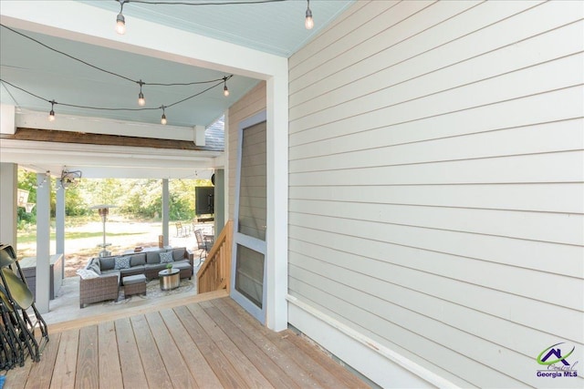 1360 Calhoun St, Macon, GA 31201 - wooden deck featuring an outdoor living space