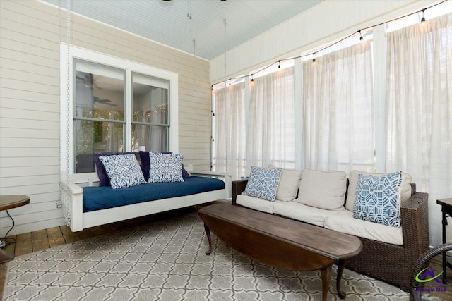 1360 Calhoun St, Macon, GA 31201 - sunroom featuring an outdoor living space, wooden walls, and a ceiling fan