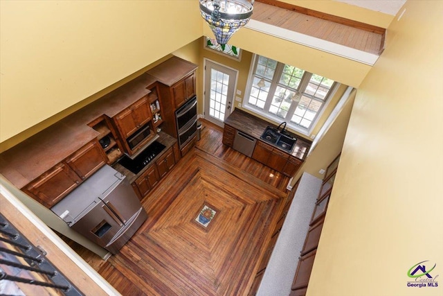 283 Limestone Rd, Cochran, GA 31014 - kitchen with a towering ceiling, stainless steel appliances, and a sink