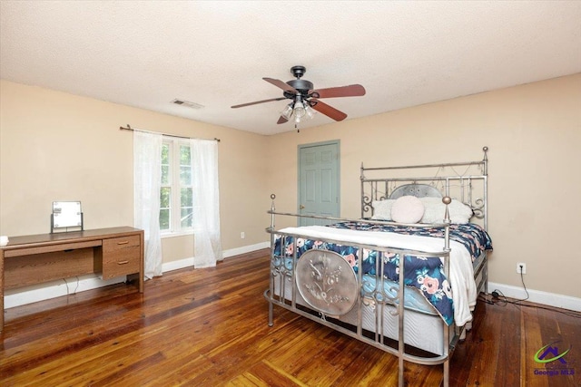 283 Limestone Rd, Cochran, GA 31014 - bedroom with baseboards, hardwood / wood-style floors, and ceiling fan