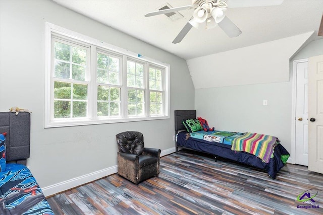 283 Limestone Rd, Cochran, GA 31014 - bedroom featuring wood finished floors, vaulted ceiling, baseboards, and ceiling fan