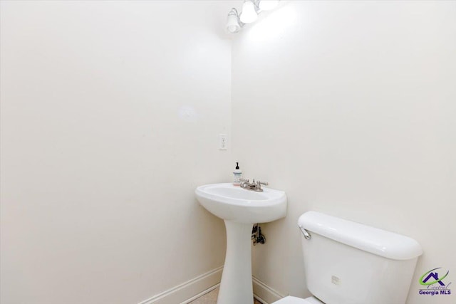 283 Limestone Rd, Cochran, GA 31014 - bathroom featuring toilet