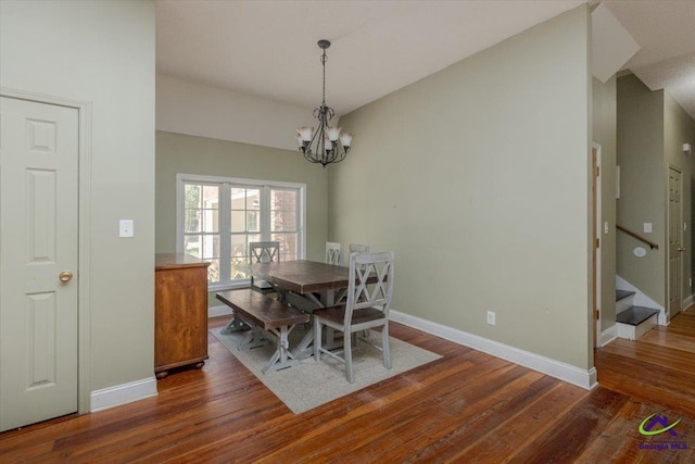 283 Limestone Rd, Cochran, GA 31014 - dining space with a chandelier, wood finished floors, baseboards, and stairs