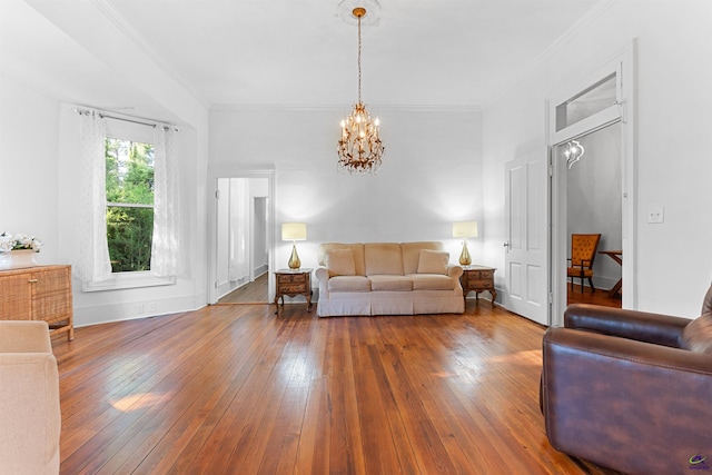 110 Minor Ave, Montezuma, GA 31063 - living area featuring a chandelier, hardwood / wood-style floors, and crown molding