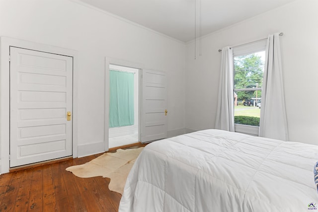 110 Minor Ave, Montezuma, GA 31063 - bedroom with hardwood / wood-style floors, crown molding, and baseboards
