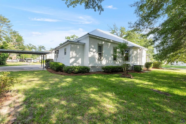 110 Minor Ave, Montezuma, GA 31063 - view of home's exterior with a yard and a carport