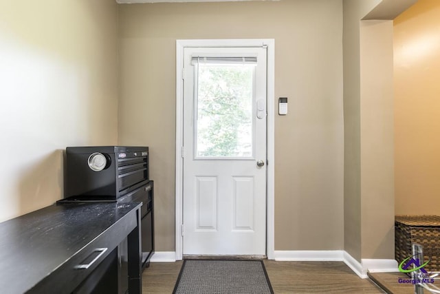 108 Marcia Ct, Warner Robins, GA 31088 - doorway to outside with baseboards and dark wood finished floors
