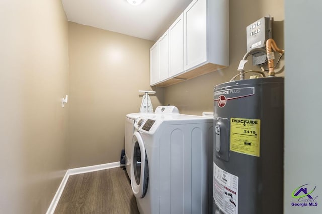 108 Marcia Ct, Warner Robins, GA 31088 - laundry area with electric water heater, washing machine and clothes dryer, cabinet space, wood finished floors, and baseboards