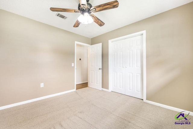 108 Marcia Ct, Warner Robins, GA 31088 - unfurnished bedroom with carpet floors, baseboards, a closet, and ceiling fan