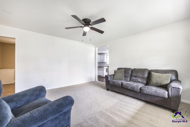 108 Marcia Ct, Warner Robins, GA 31088 - carpeted living area with ceiling fan and baseboards