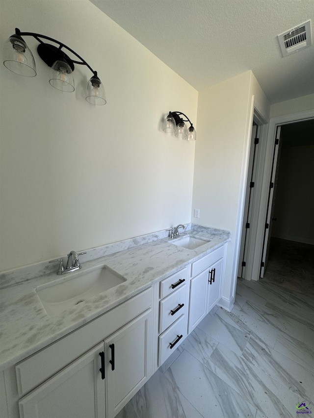 502 Otters Ridge Dr, Kathleen, GA 31047 - bathroom featuring double vanity and marble look tile flooring