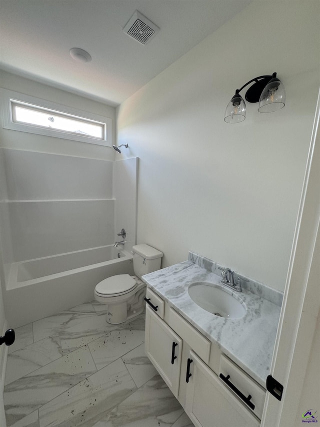 502 Otters Ridge Dr, Kathleen, GA 31047 - bathroom featuring vanity, toilet, bathing tub / shower combination, and marble look tiles