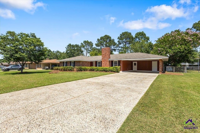214 Markwood Dr, Warner Robins, GA 31093 - ranch-style home featuring driveway, a chimney, and a carport