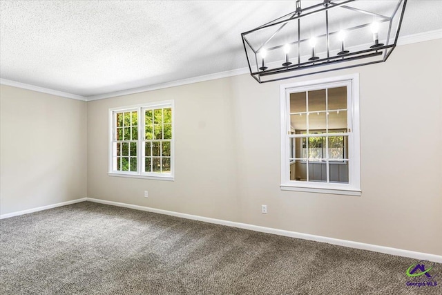 214 Markwood Dr, Warner Robins, GA 31093 - empty room featuring carpet, crown molding, baseboards, a textured ceiling, and a chandelier