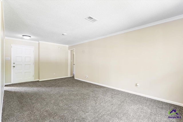 214 Markwood Dr, Warner Robins, GA 31093 - unfurnished room featuring ornamental molding, dark colored carpet, baseboards, and a textured ceiling