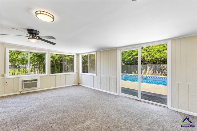214 Markwood Dr, Warner Robins, GA 31093 - unfurnished sunroom with a ceiling fan and a wall unit AC
