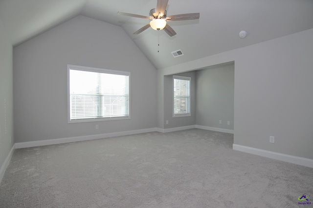 606 Samantha Brooke Way, Bonaire, GA 31005 - spare room featuring ceiling fan, vaulted ceiling, carpet floors, a smoke detector, and baseboards