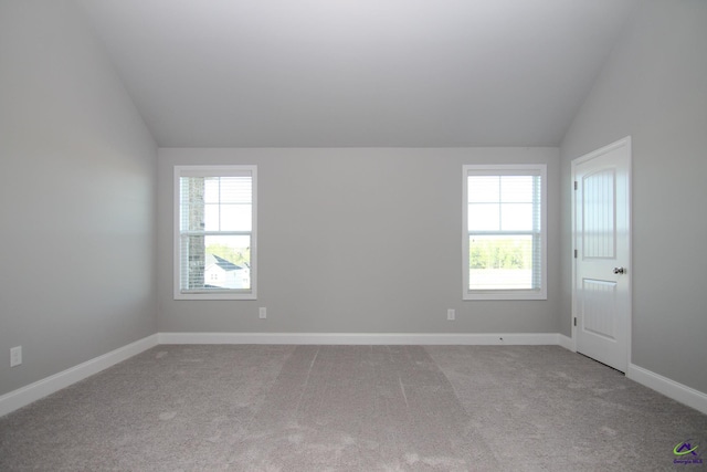 606 Samantha Brooke Way, Bonaire, GA 31005 - unfurnished room with vaulted ceiling, carpet, and baseboards