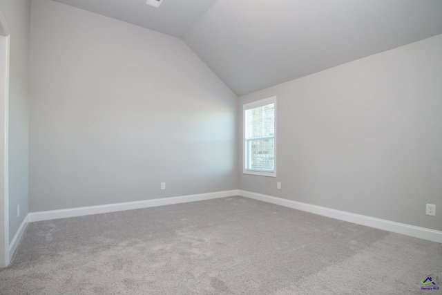 606 Samantha Brooke Way, Bonaire, GA 31005 - unfurnished room featuring carpet flooring, lofted ceiling, and baseboards