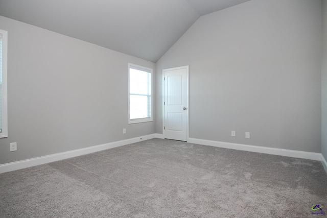 606 Samantha Brooke Way, Bonaire, GA 31005 - unfurnished room featuring vaulted ceiling, carpet flooring, and baseboards