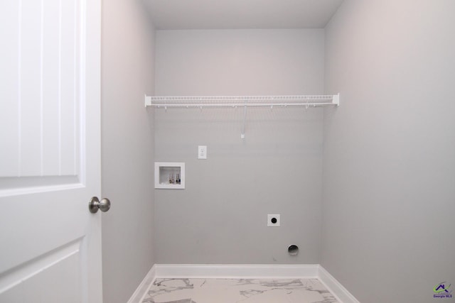 606 Samantha Brooke Way, Bonaire, GA 31005 - laundry room featuring hookup for an electric dryer, marble look tiles, baseboards, and hookup for a washing machine