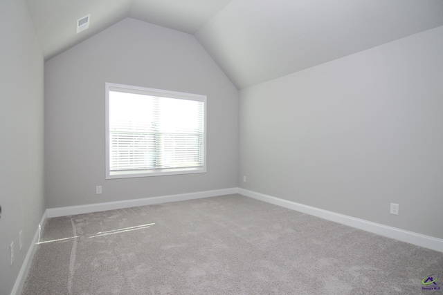 606 Samantha Brooke Way, Bonaire, GA 31005 - bonus room featuring carpet flooring, vaulted ceiling, and baseboards